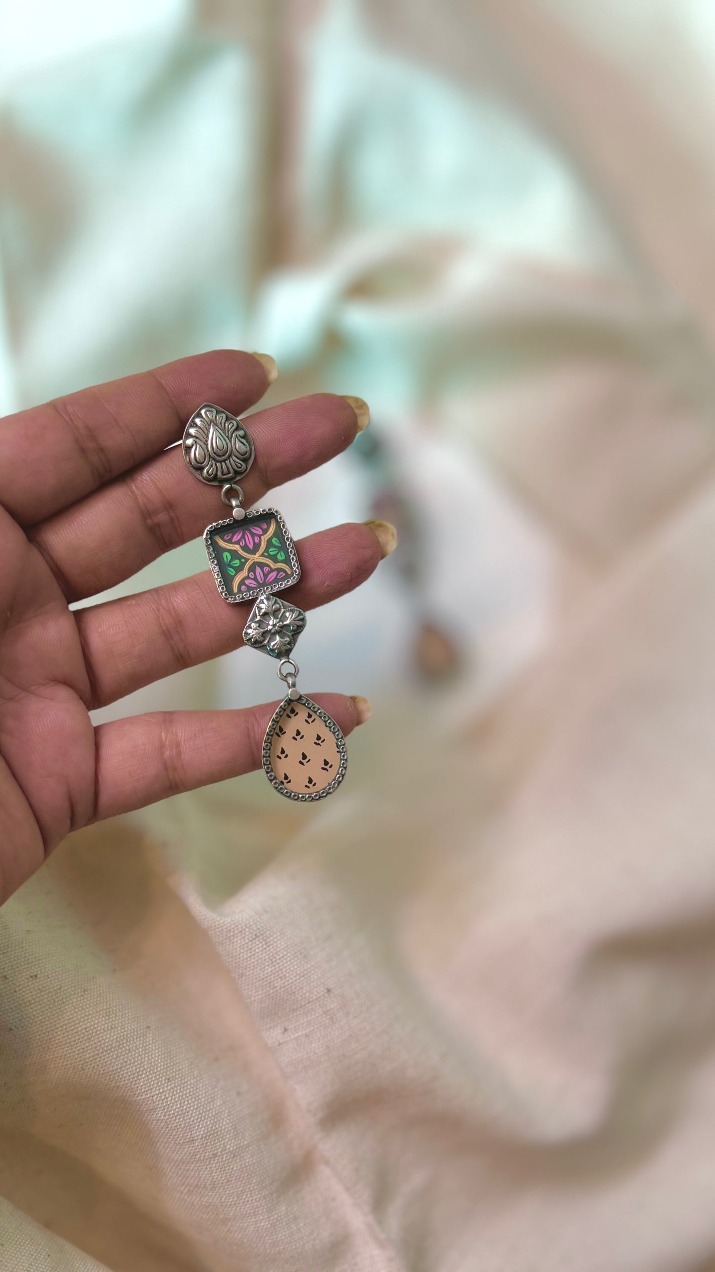 “Tulsipriya”: Timeless beauty in silver earring designs.