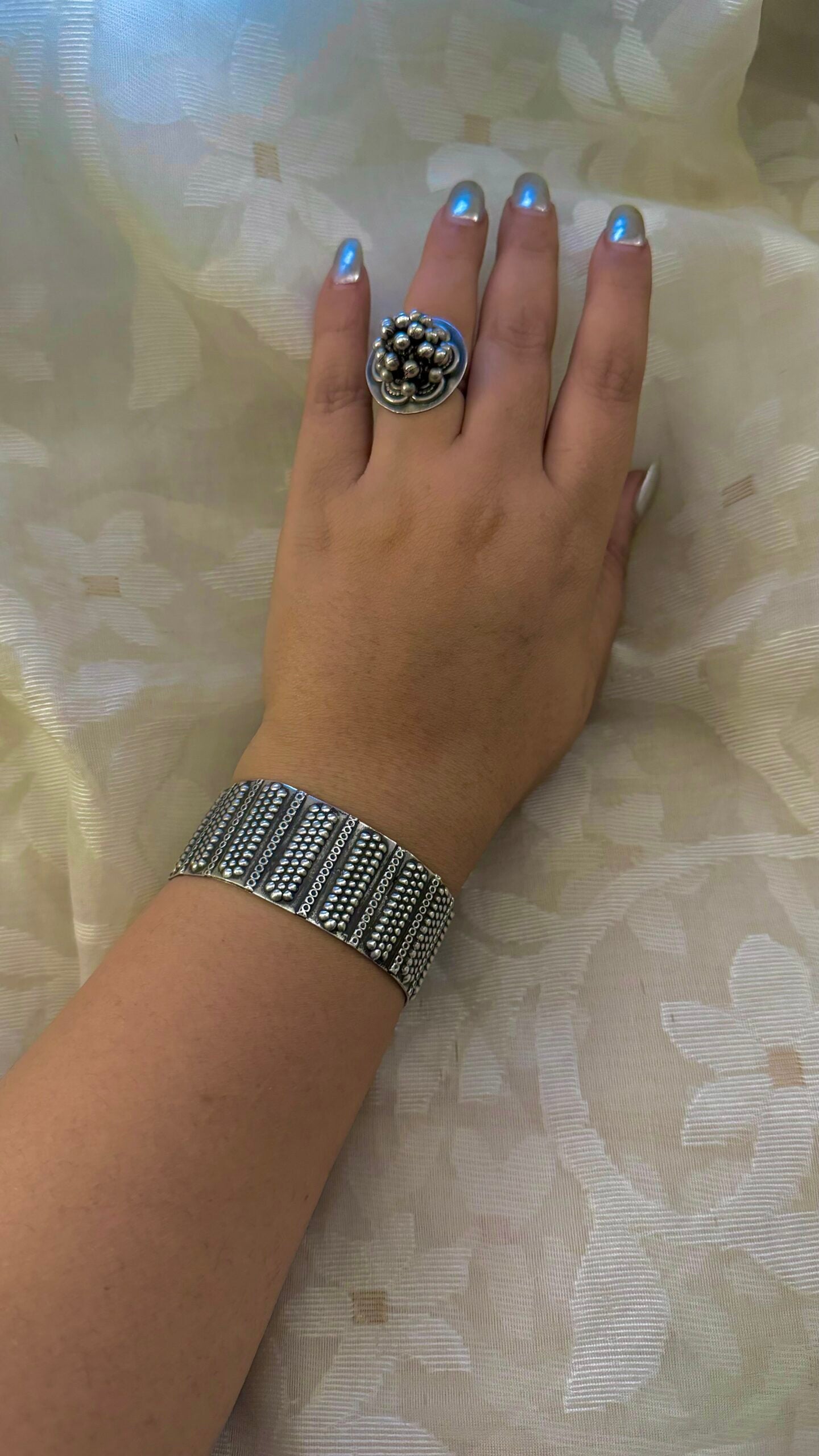 "Bindini" - Silver cuffs that whisper tales of craftsmanship and sophistication. A symbol of your refined taste.