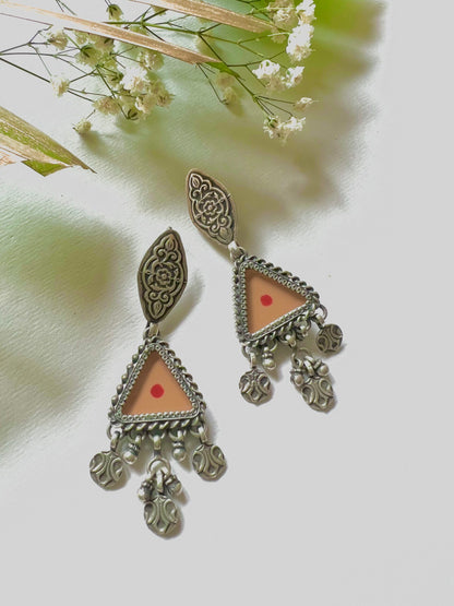 "Jeevika": Graceful orange Hand-painted earrings with versatile silver hangings with tribal patterns