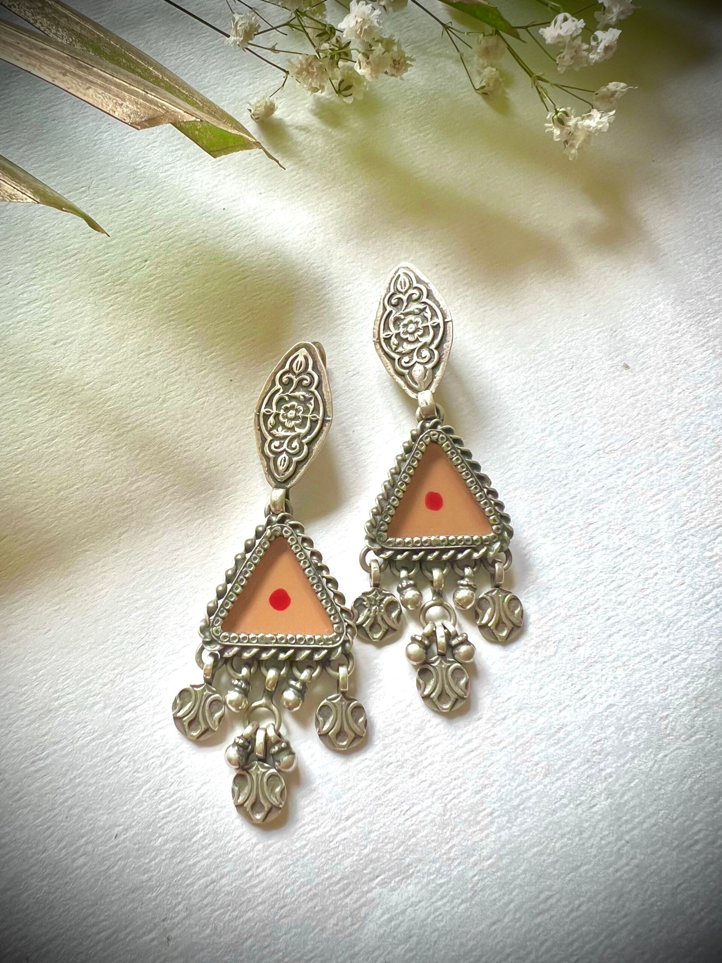 "Jeevika": Graceful orange Hand-painted earrings with versatile silver hangings with tribal patterns