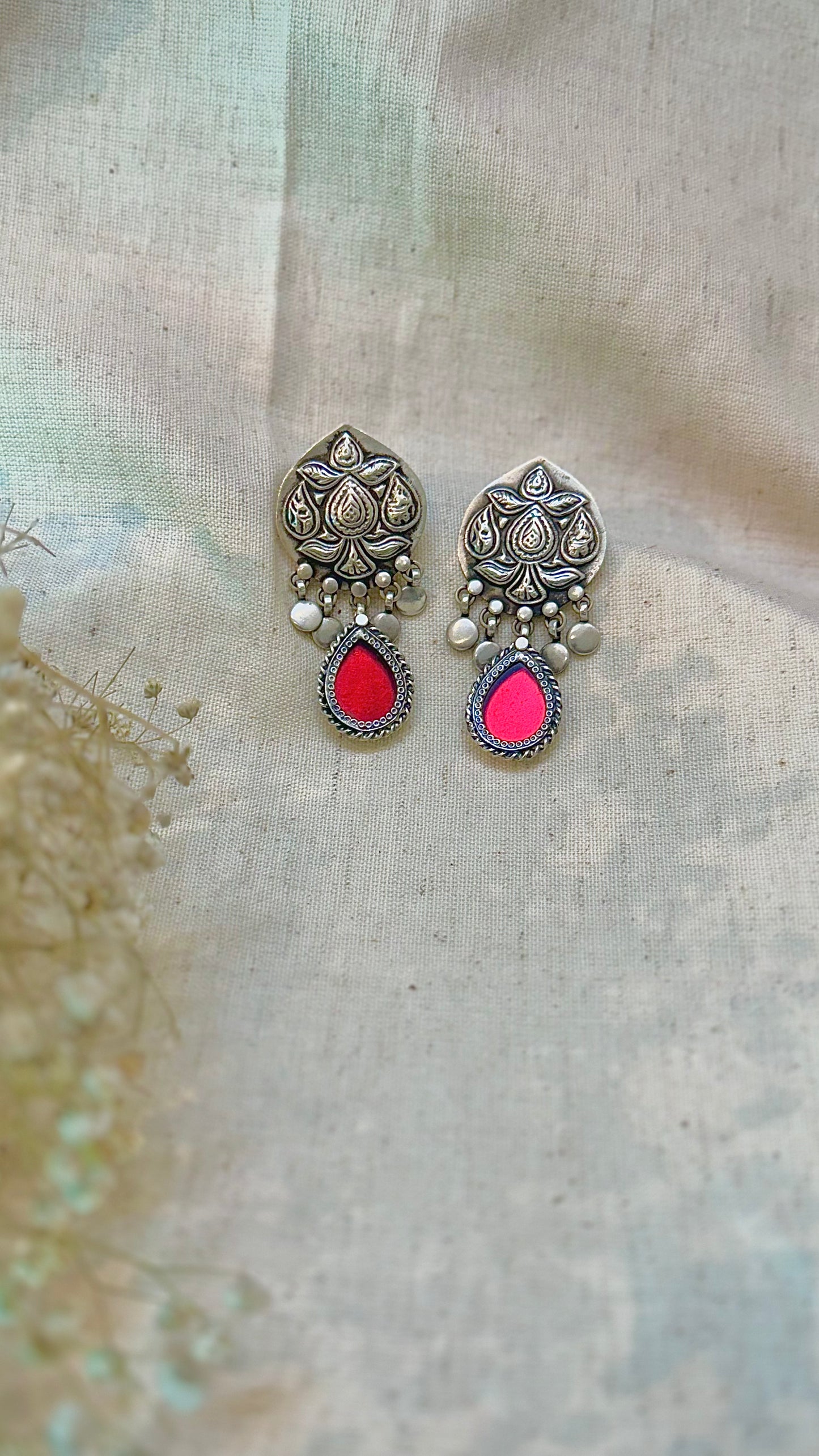 Coral Radiance : Elevate your look with these eye-catching earrings