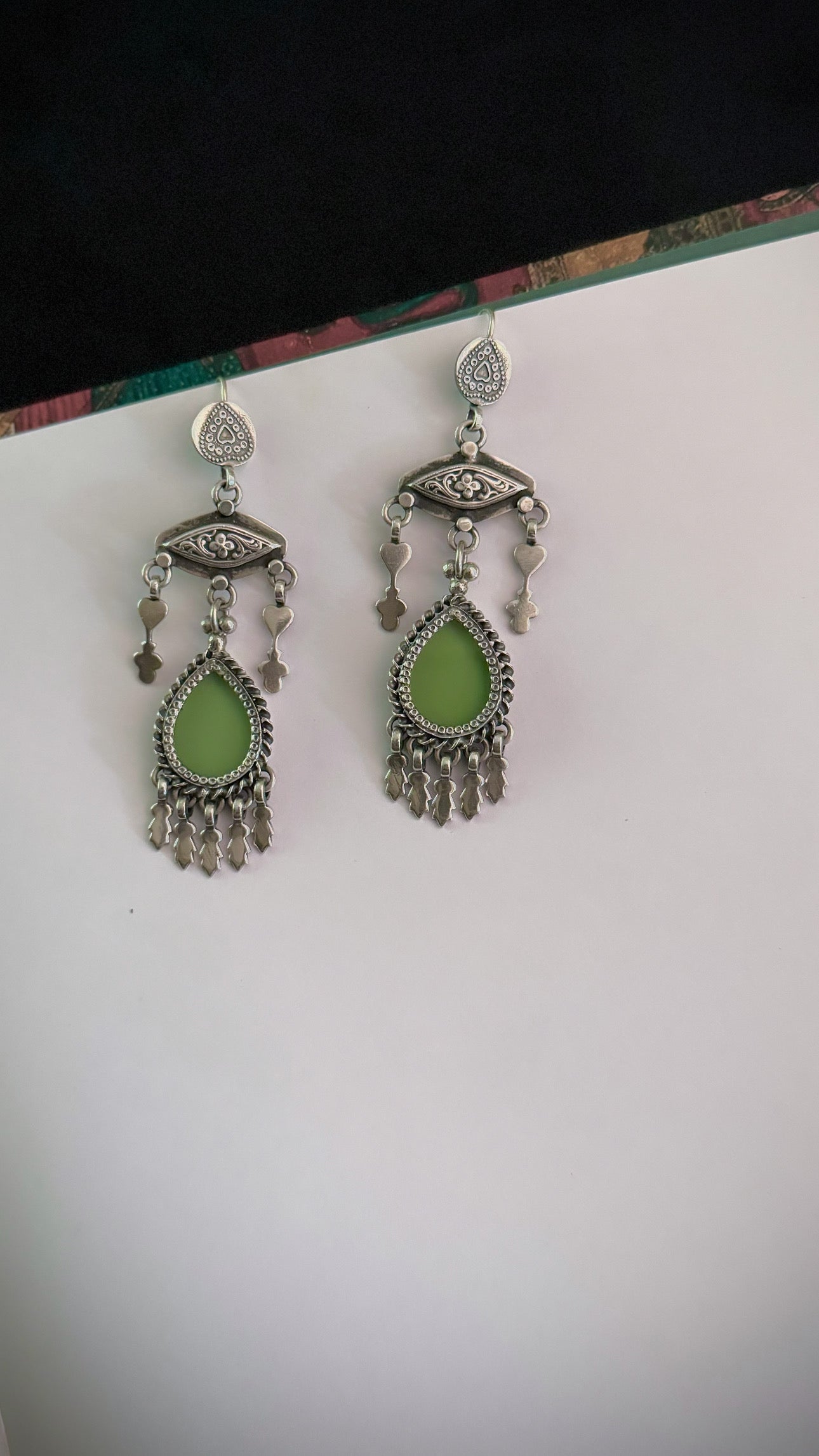 HawaMahal  : Embrace elegance with our silver earrings, reflecting the charm of a royal heritage!