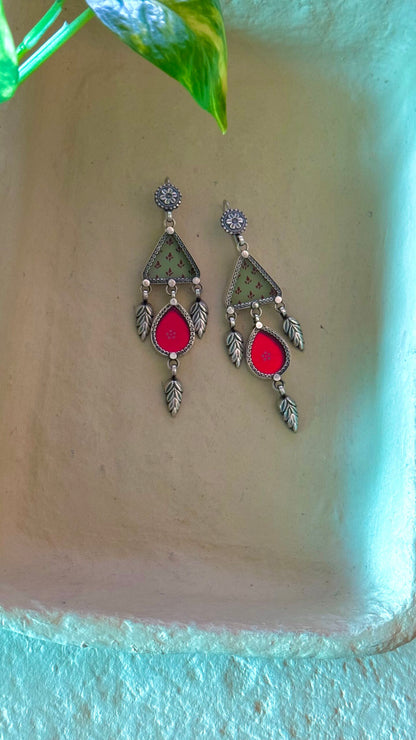 Kashvi : Silver whispers the language of colors, adorning ears with timeless grace.