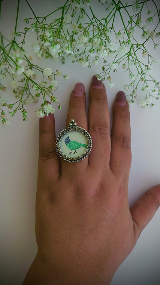 "Chidiya”- Tiny canvases of elegance: Explore our Chidiya hand-painted pure silver rings.