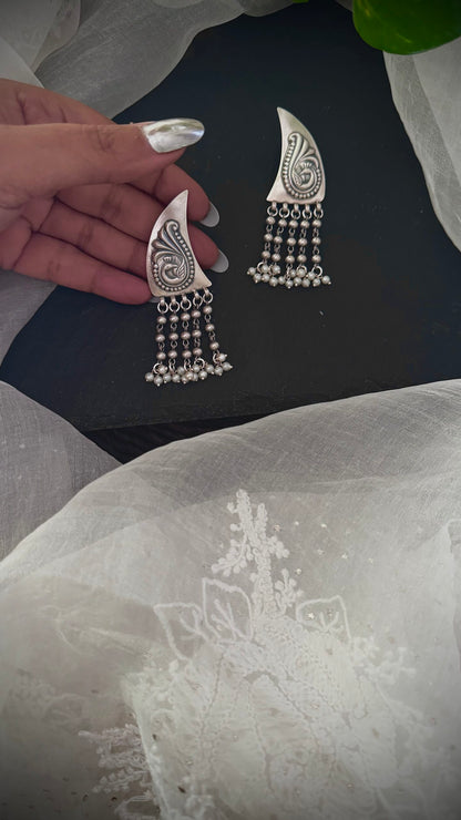 "Devi's Delight Drops" : Captivate hearts with the ethereal beauty of silver and pearls