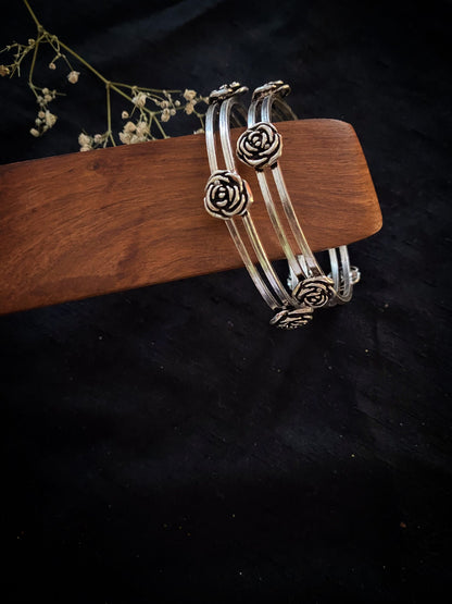 Prasun - Set of Plain Bangles with Flower Motif