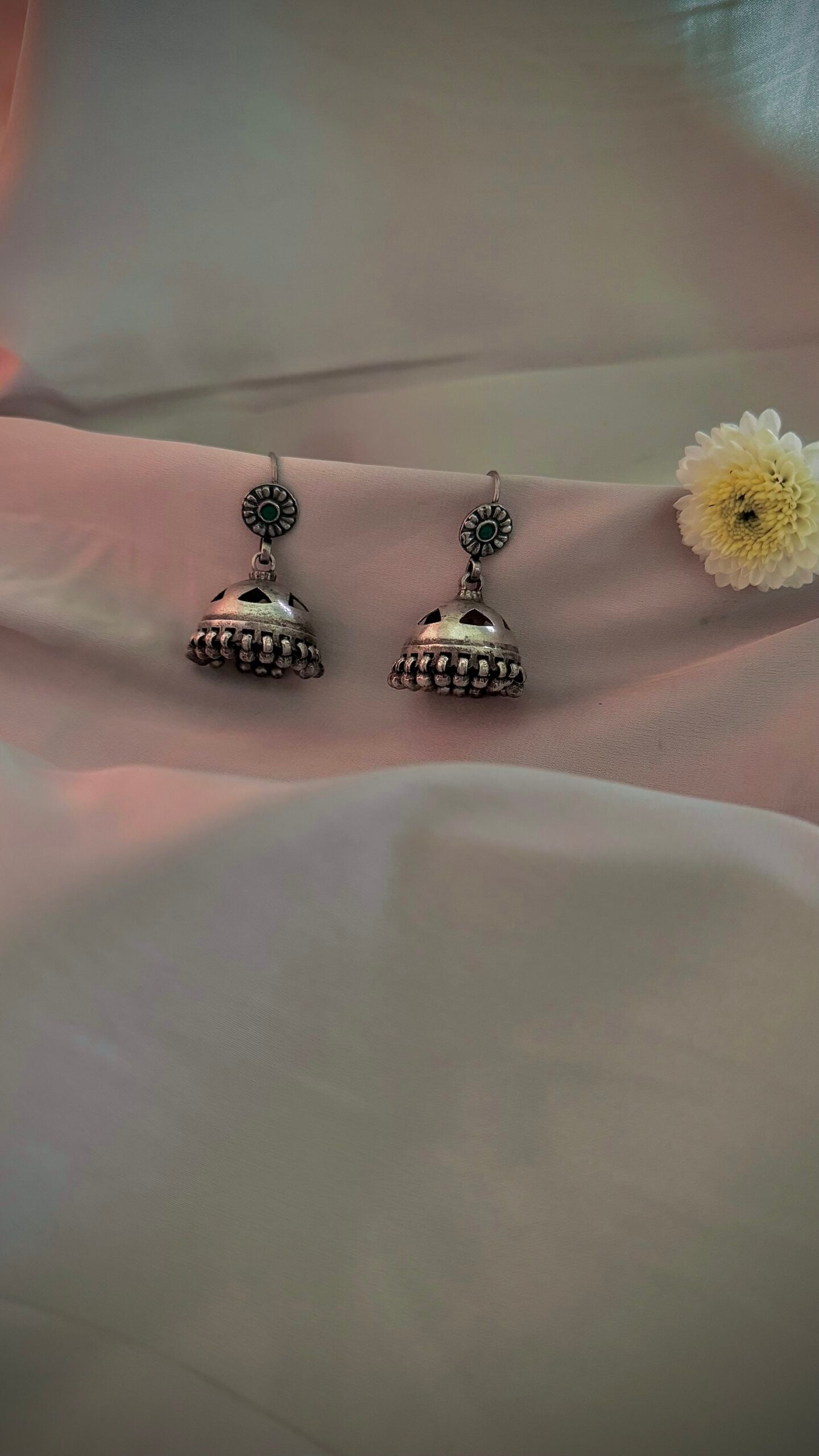 "Sundar Saanjh" : Experience the magic of these pure silver jhumkis, adorned with handcrafted silver hangings