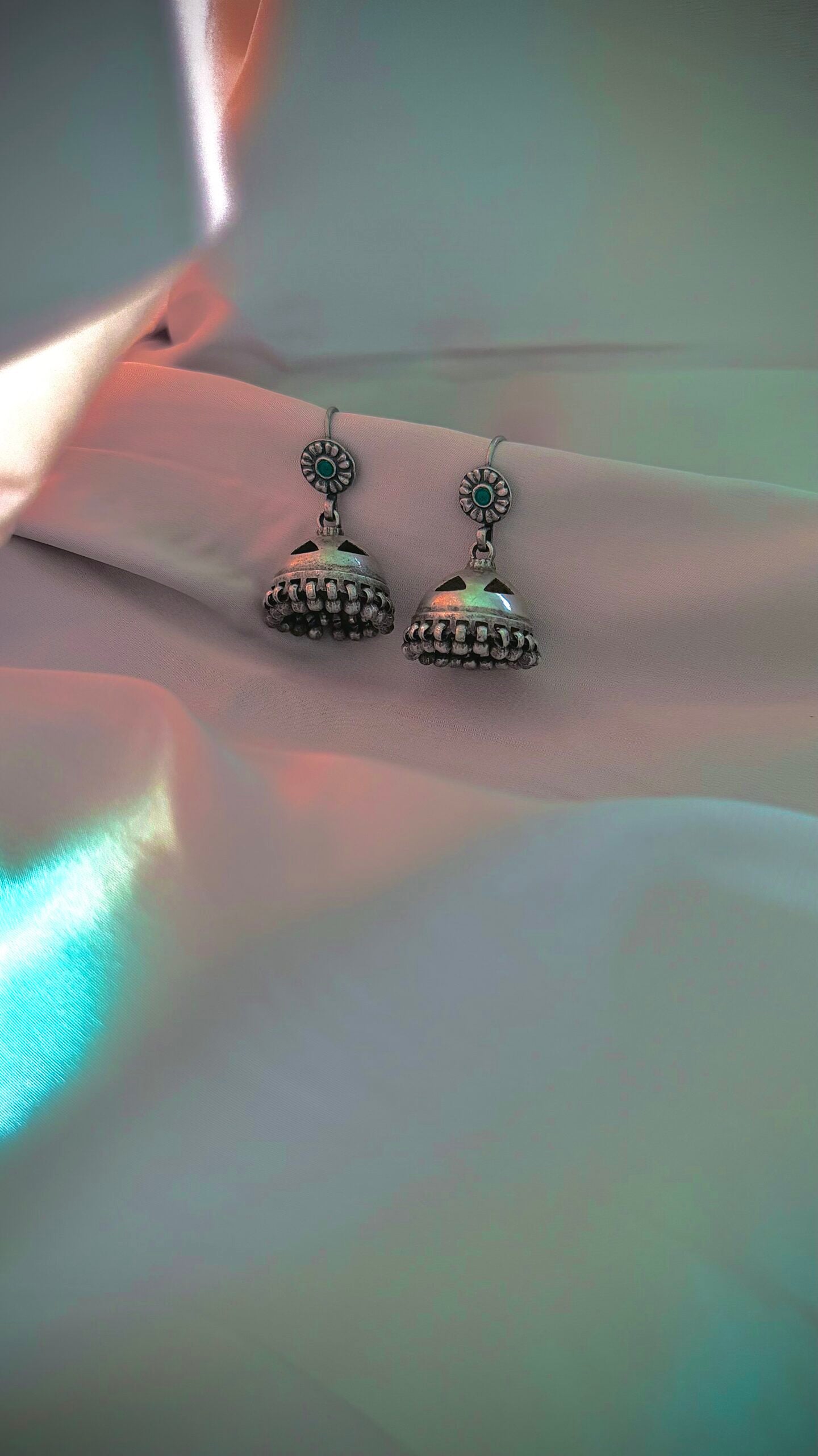 "Sundar Saanjh" : Experience the magic of these pure silver jhumkis, adorned with handcrafted silver hangings