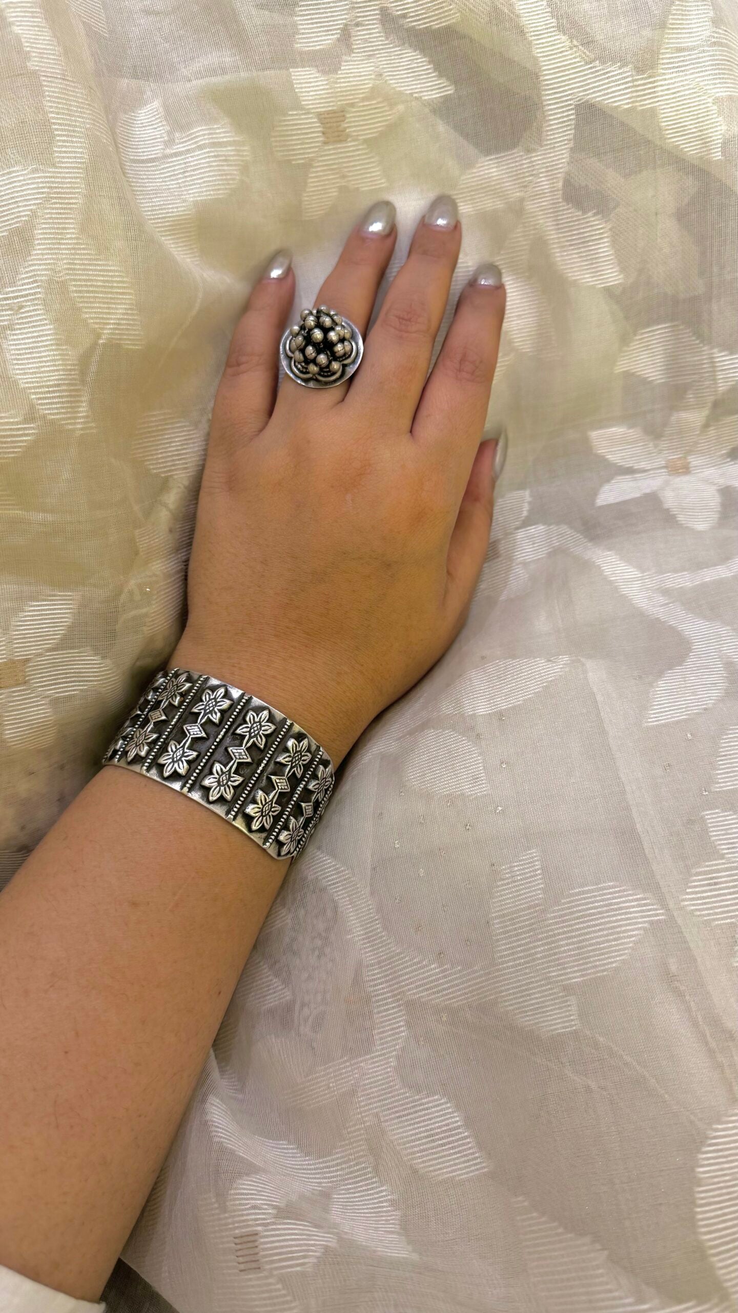 "Suman" - Silver cuffs that whisper tales of craftsmanship and sophistication. A symbol of your refined taste.