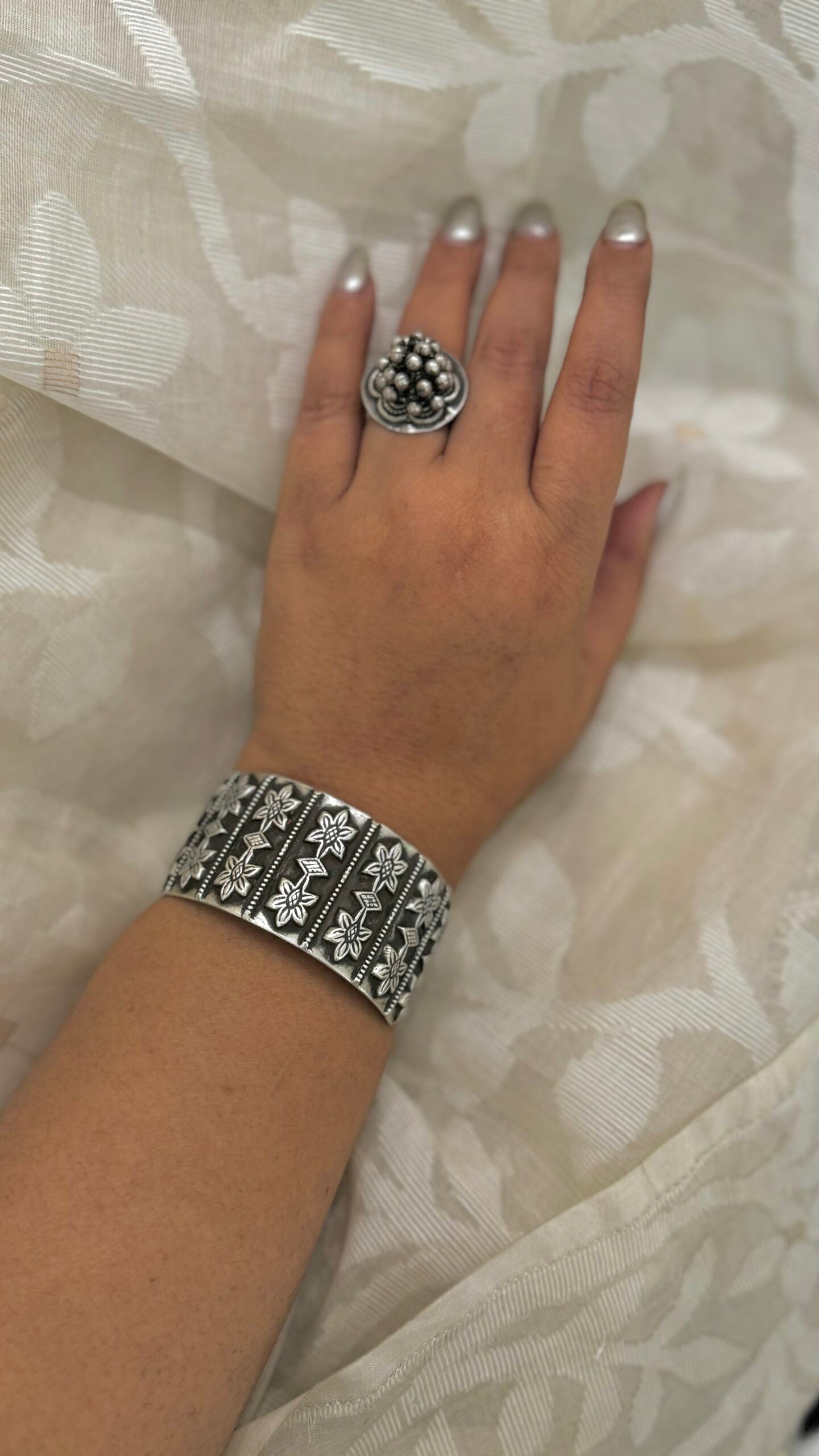 "Suman" - Silver cuffs that whisper tales of craftsmanship and sophistication. A symbol of your refined taste.