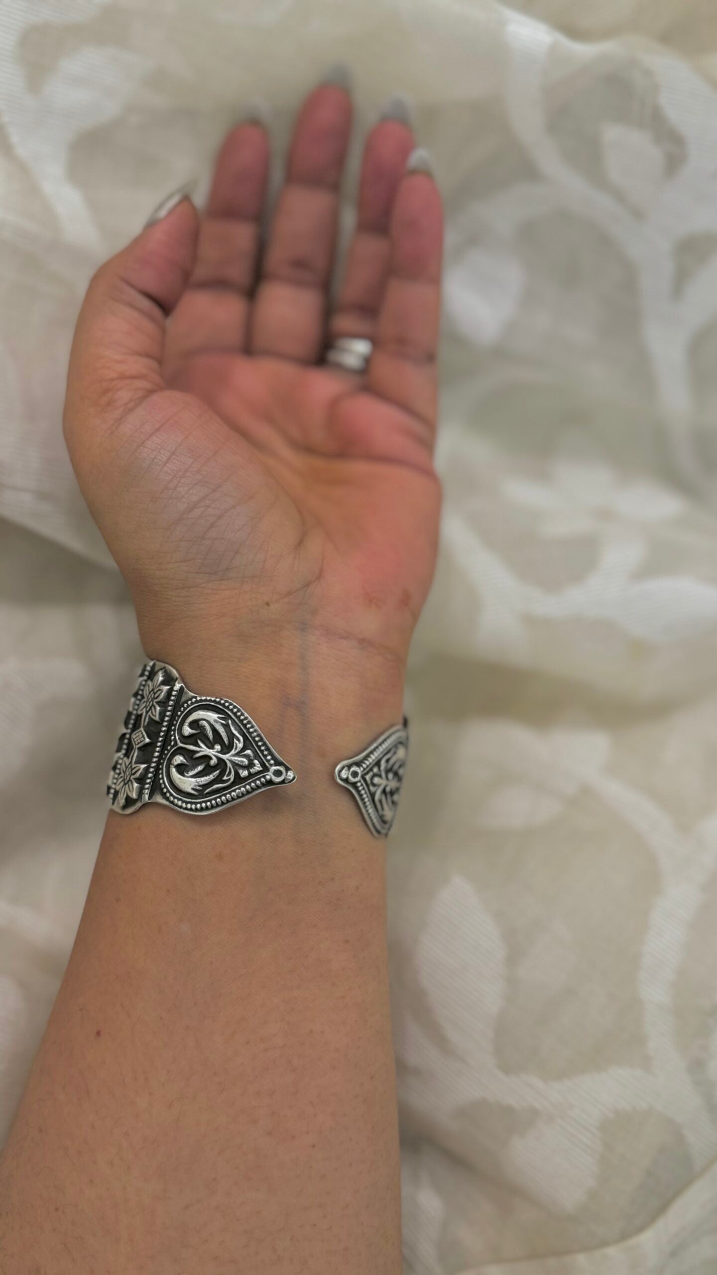 "Suman" - Silver cuffs that whisper tales of craftsmanship and sophistication. A symbol of your refined taste.