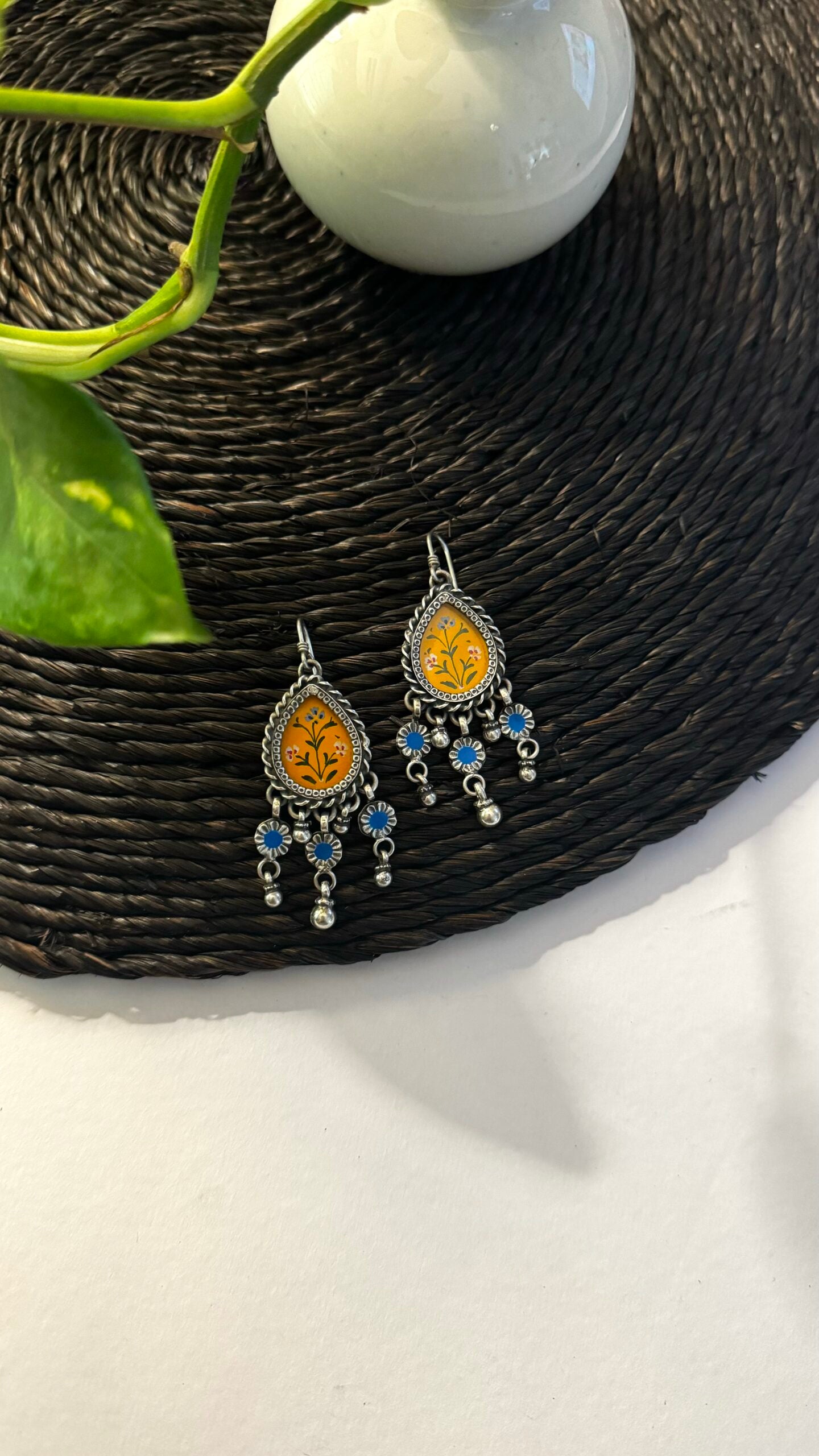 Daisy dreams come to life: Wear the sunshine with our handcrafted yellow earrings.