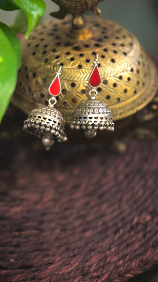 Radiate Charm: Silver Jhumkas for the Modern Muse.