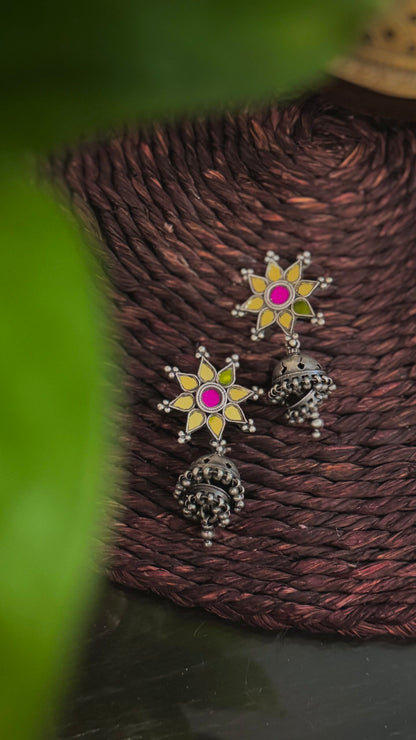 Sophistication in Silver: Elevate Your Look with Jhumkas.