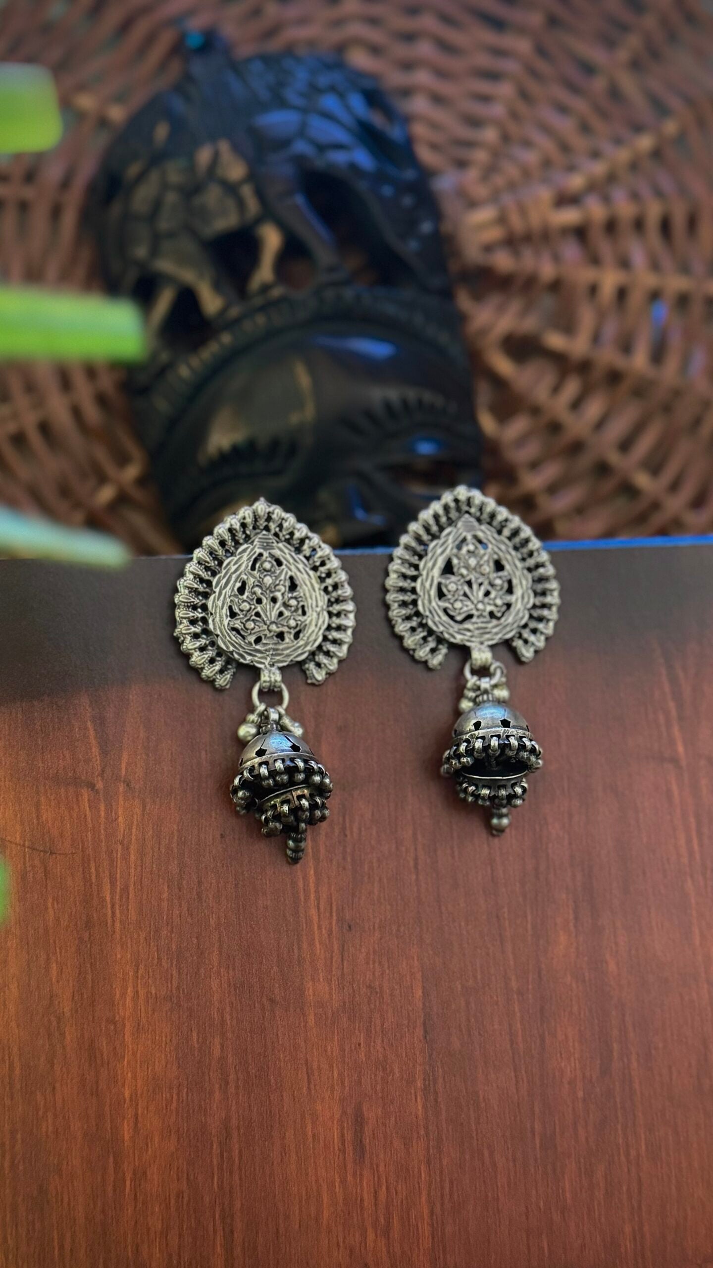 Whispers of Heritage: Adorn with Silver Jhumkas.