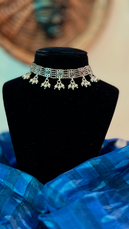 Juhi : "Blue Stone" : Elegance in simplicity: Adorn yourself with a timeless silver choker.