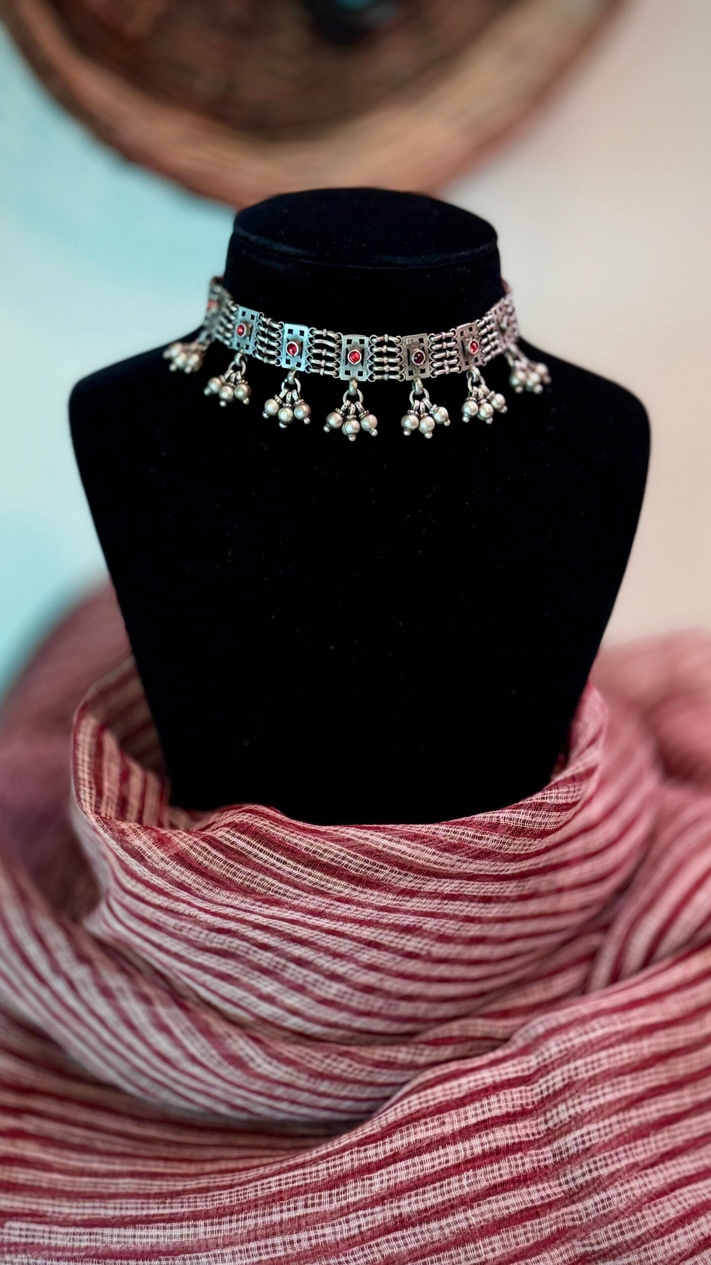 Juhi : "Red Stone" : Elegance in simplicity: Adorn yourself with a timeless silver choker.