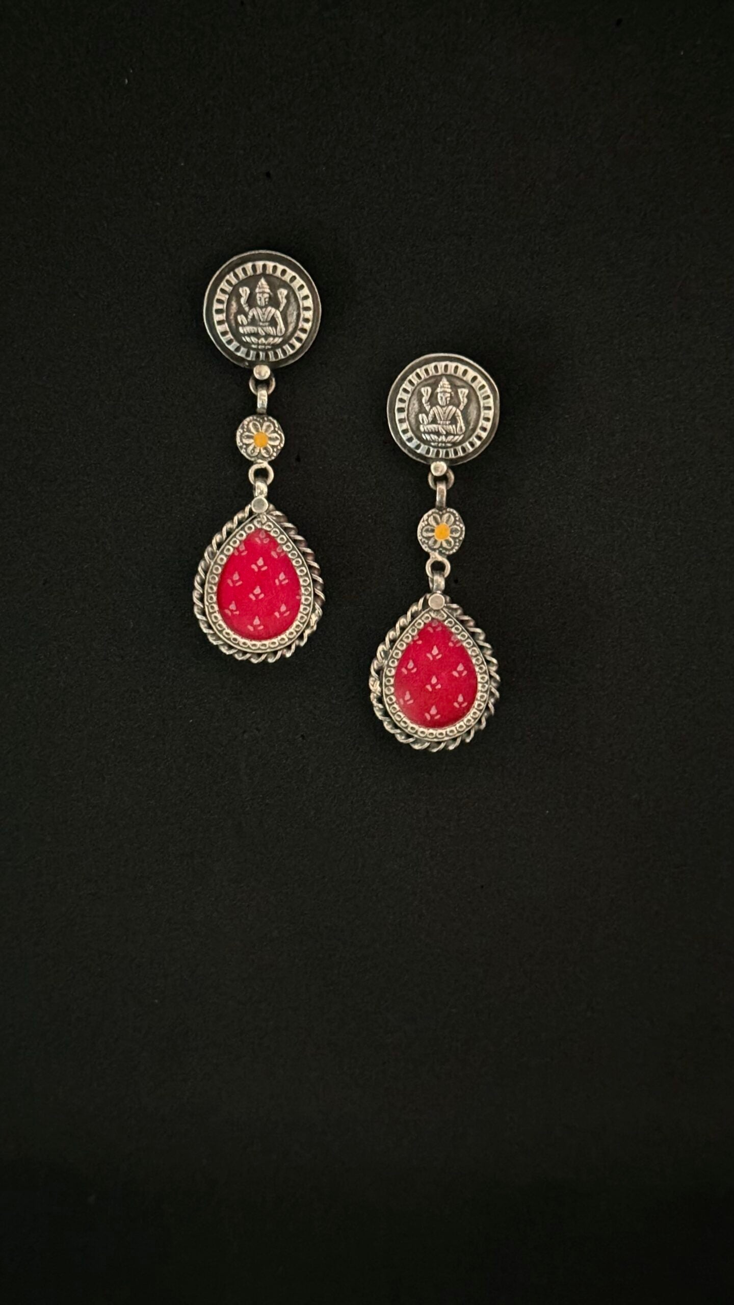 Devi Katyayani : Wear the legacy of Devi with these exquisite silver earrings.